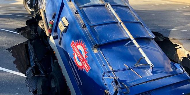 Garbage Truck Collapses; No Injuries