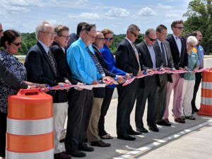 Putnam County and Tennessee State officials cut the ribbon to officially open Putnam County's Fifth Interchange on Exit 283. (Photo Cre