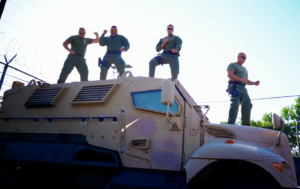 Members of the Cumberland County Sheriff's Office dance on an armored truck while singing to Austin Mahone's 'Dirty Work'. (Source: Cumberland County Sheriff's Office Facebook Page).