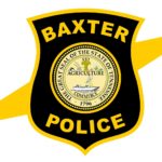 Baxter Police Chief Danny Holmes commended Officer Ryan Bean for his efforts in an arrest made Saturday at Speedway. Bean suffered minor injuries after being dragged by the suspect (Archived Photo)