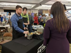 Members of Outback Steakhose present samples to visitors of the Fall Bizapalooza event hosted by the Cookeville-Putnam County Chamber of Commerce. (Photo: Logan Weaver)