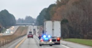 A truck driver is pulled over by the Tennessee Highway Patrol after being caught texting while driving. [Photo: Logan Weaver]