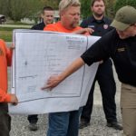 Hamilton County Rescue Lt. Brian Krebs points to a cave map, showing where rescuers believe a missing British cave diver may be located (Photo: Logan Weaver)