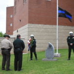 Cookeville Police Chief Randy Evans, THP Captain R.C. Christian, and Putnam County Sheriff Eddie Farris place a wreath in memory of fallen officers at the Putnam County Sheriff's Office (Photo: Logan Weaver)